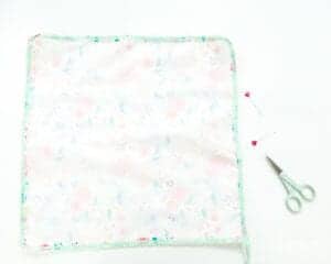 diy-pom-pom-napkin-tutorial-with-mitered-corners