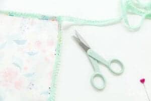 how-to-sew-dinner-napkins-with-pom-pom-trim